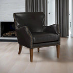 Fauteuil à oreilles, à accoudoirs inclinés, à dossier haut et pieds hauts, marron foncé