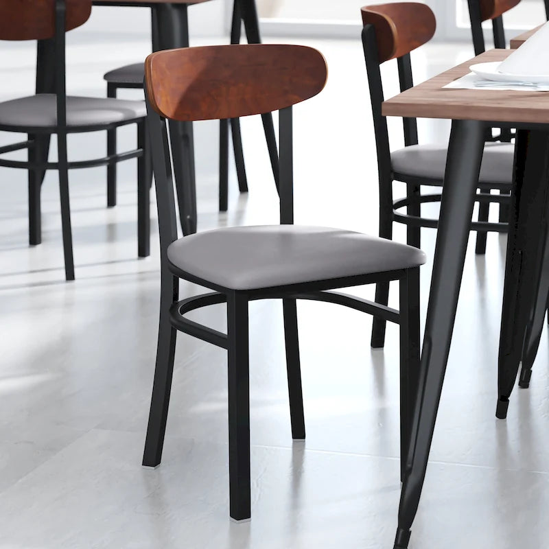 Chaise de salle à manger commerciale en métal avec assise en bois et dossier boomerang
